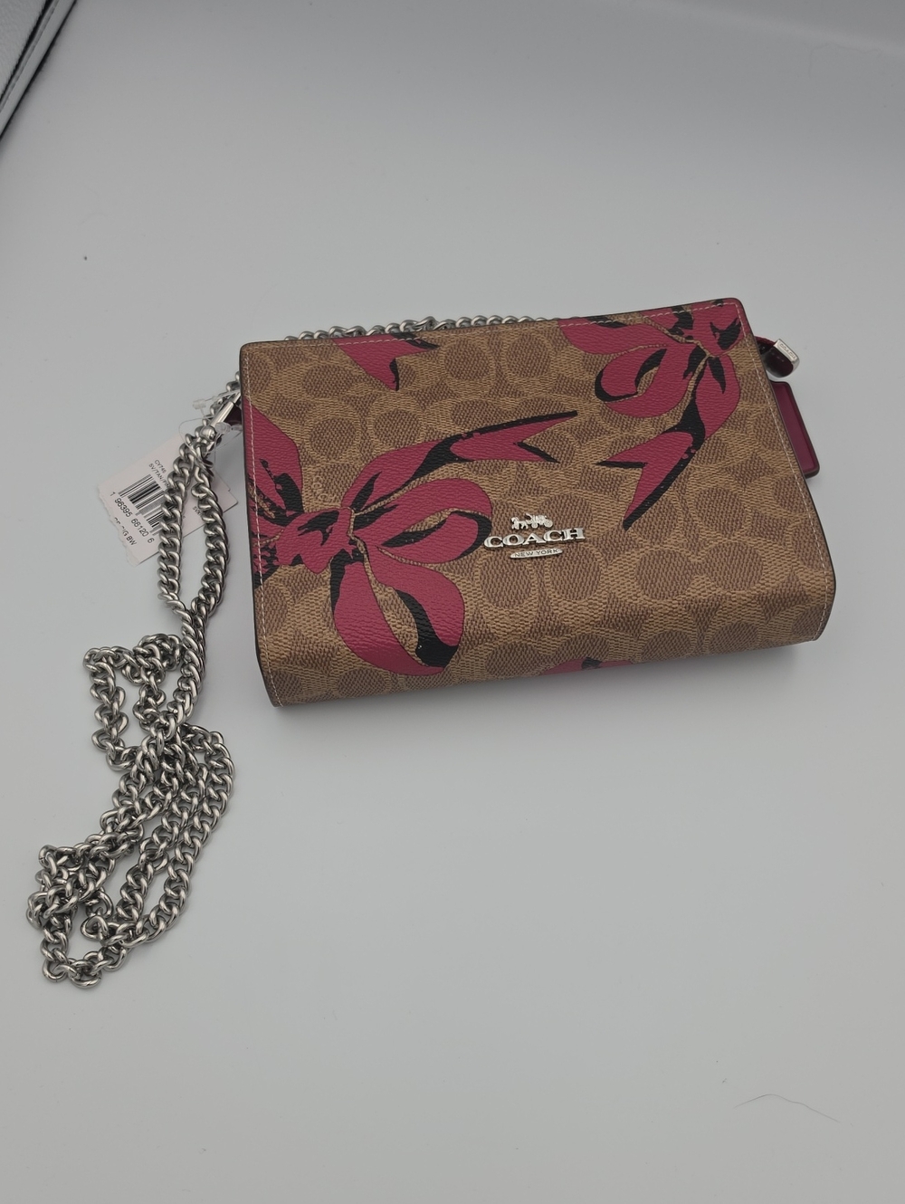 Coach Brown Signature Crossbody with Pink Floral Accents